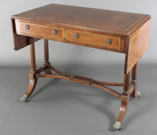 A Georgian style inlaid mahogany sofa table fitted 2 drawers, raised on turned and reeded supports with Y shaped stretcher 30"h x 37"when closed x 59" when extended x 22"w  