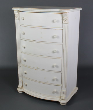 A French style white painted bow fronted chest of 6 long drawers with fluted columns to the side and tore handles, raised on bun feet 48"h x 31"w x 18"d 