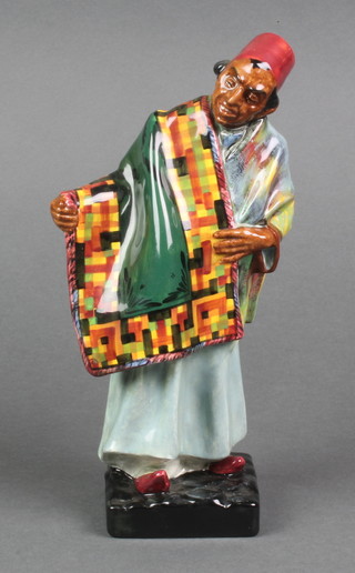 A Royal Doulton figure - Carpet Seller HN1464 9" 