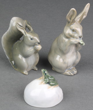 A Danish figure of a squirrel 2 1/2", a ditto of a hare 1019 4" and a frog on a rock 507 1/2" 