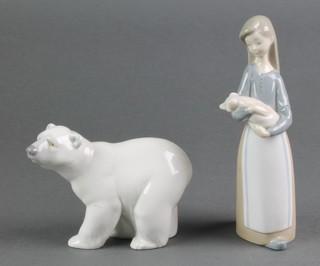 A Lladro figure of a standing polar bear A14M 4" and a ditto of a girl with piglets 6 1/2" 