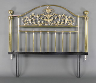 A Victorian style brass bed head 50"h x 55"w 
