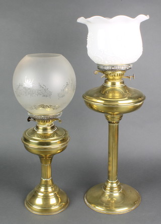 2 brass oil lamps with opaque glass shades converted for use as table lamps  
