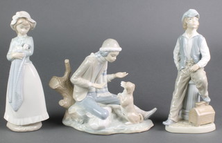 A nao figure of a girl with puppy 10", a ditto of a boy with dog 9" and another of a seated young shoe cleaner 10" 