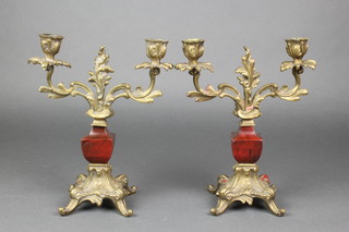 A pair of Rococo style gilt ormolu twin light candelabra with waisted lacquered panel to the centre 10"