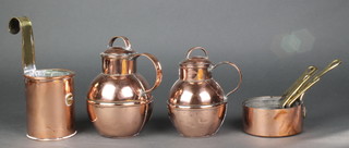 A copper and brass pint milk measure, 5 graduated copper and brass saucepans 4", 3 1/2", 3", 2 1/2" and 2" together with 2 Delarue copper Jersey milk canisters 6" and 5" 