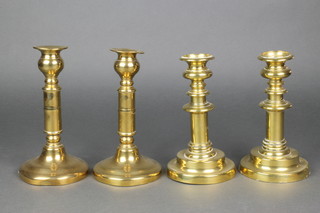2 pairs of 19th Century brass candlesticks with ejectors 7" and 8" 