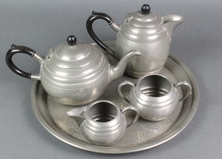 An Art Deco 5 piece planished pewter tea service with tray 14", teapot, jug, sugar bowl and cream jug, marked Hand Hammered Pewter 