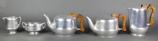 A Picquot 5 piece tea set comprising 2 teapots, hot water jug, cream jug and sugar bowl 