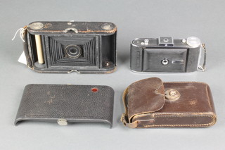 An Agfa  Billy Compur 9 x 5 folding camera and a Kodak NO.3 automatic folding camera