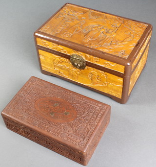 A carved camphor box with hinged lid decorated figures 6" x 12"w x 8"d and a carved Indian wooden box with hinged lid 3" x 10" x 6" 
