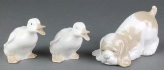 A Nao figure of a puppy 5" and 2 ditto geese 3" 