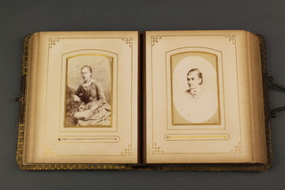 A Victorian leather bound photograph album 