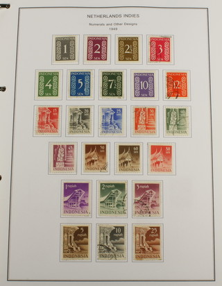 An album of Indonesian stamps 1949-2000 and Netherlands Indies, an album of mint and used Bulgarian stamps 1980-1990 and an album of mint and used Czechoslovakian stamps 1961-1992