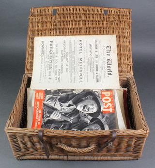 A picnic hamper containing 2 editions of "The World" Wednesday 25th May 1887 and various editions of "The Illustrated London News", "Picture Post" etc 