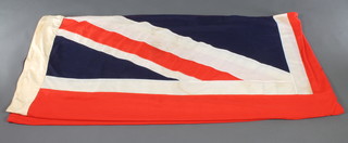A stitched Union flag 64" x 137 1/2", some light staining 