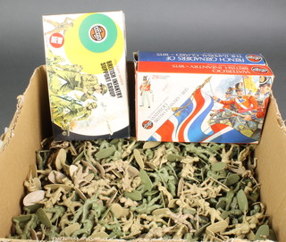 A large collection of various Airfix 1/32 scale models of soldiers