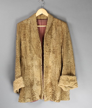 A lady's light Persian lamb 3/4 length jacket together with a beaver lamb full length jacket with brown fur collar 