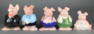 A set of 5 Wade Natwest piggy banks
