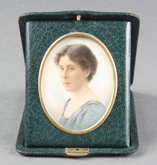 An early 20th Century watercolour miniature portrait of a lady 2 1/2" x 2" 