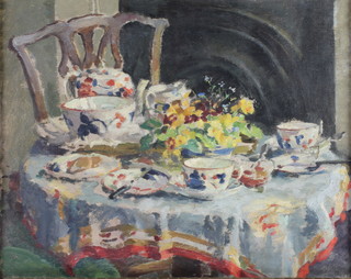 J Mason '46, oil on canvas, signed, a still life study of a table laid for tea 16 1/2" x 19 1/2" 
