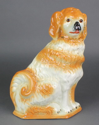 A Victorian Staffordshire figure of a Spaniel with glass eyes 