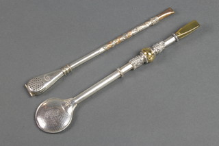 Two 20th Century white metal and gilt mounted Mate spoons 