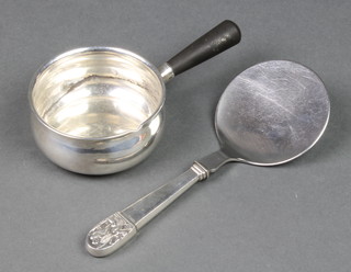 A Danish silver brandy warmer with ebonised handle and a ditto serving spoon