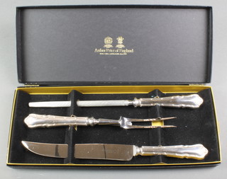 A cased set of silver plated carvers by Arthur Price