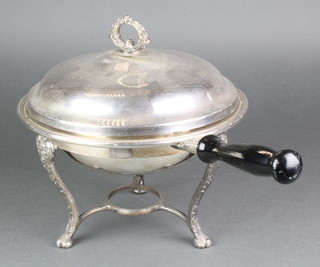 A silver plated food warmer and cover with ebony handle on stand