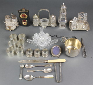 A silver plated caster and minor plated items