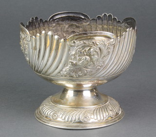 An Edwardian repousse silver rose bowl with demi-fluted and floral decoration Sheffield 1903, 300 grams