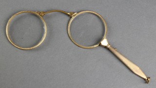 A pair of gilt engine turned lorgnettes 