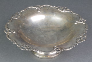 A silver tazza with pierced scroll rim, Birmingham 1913, 8 1/2" 310 grams 