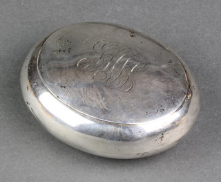 An Edwardian oval silver tobacco box with engraved monogram Birmingham 1907, 76 grams 3 1/4" 
