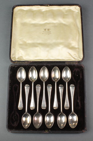A set of 10 Edwardian silver teaspoons with chased armorial and galleon backs 136 grams, Sheffield 1901 