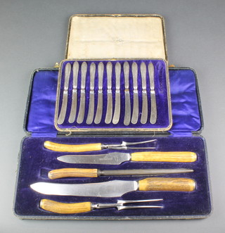 A cased 5 piece carving set with horn handles and a set of silver handled butter knives 