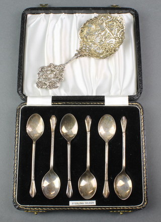 A cased set of 6 silver coffee spoons, Birmingham 1958, 40 grams together with a Continental pierced sifter spoon 