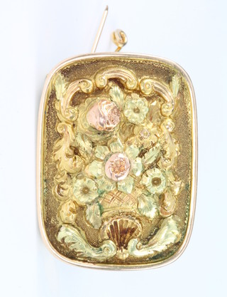 A 19th Century French high carat 3 colour gold vinaigrette, decorated with a shell, scrolls and an urn of flowers 1 1/4" x 1", now converted to a brooch, 11 grams 