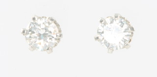 A pair of 18ct white gold brilliant cut single stone diamond ear studs, each approx. 0.5ct