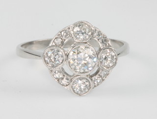 An 18ct white gold 19 stone diamond cluster ring, size O 