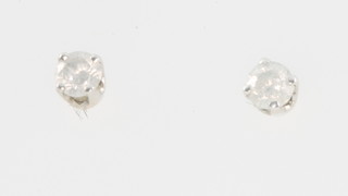 A pair of 14ct white gold single stone diamond ear studs, each approx. 0.10ct  
