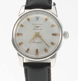 A gentleman's steel cased Longines automatic Conquest calendar wristwatch on a leather strap 