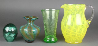 A green glass paperweight 4", a studio glass baluster vase 6", a crackle glazed ditto 7" and a yellow jug 9" 