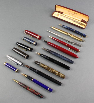 A gold plated engine turned Yard O lead pencil in box, a Conway Stuart marbled fountain pen with 14ct gold nib, a Parker Maxime burgundy fountain pen with 14ct nib, 4 other fountain pens, a Conway Stewart 25 blue marble propelling pencil, 4 others  