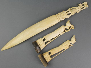 2 Egyptian carved ivory figures 5" together with a carved bone paper knife 