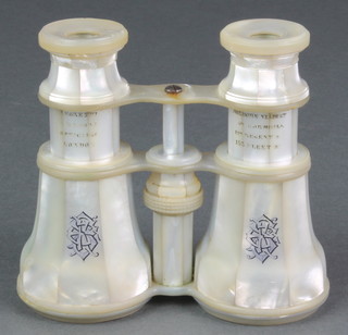 A pair of Victorian mother of pearl opera glasses inscribed Negretti  Zambra London with monogram 4" 