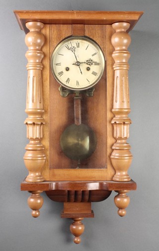A Wurttemberg striking Vienna style wall clock with 5" circular paper dial contained in a mahogany case 