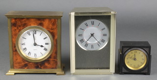 An Art Deco alarm clock with gilt dial and Arabic numerals contained in a black Bakelite case 2 1/2", an Alcan 1950/60's timepiece with silvered dial and Roman numerals contained in a silvered wedge shaped case 6" and  a Goldcircle quartz timepiece with enamelled dial and Roman numerals in a tortoiseshell effect and gilt metal case 5 1/2" 
