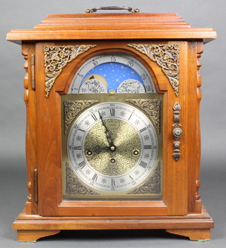 Emperor, a reproduction Georgian style chiming bracket clock, the gilt arched dial with phases of the moon, silver chapter ring and Roman numerals, contained in a mahogany case 